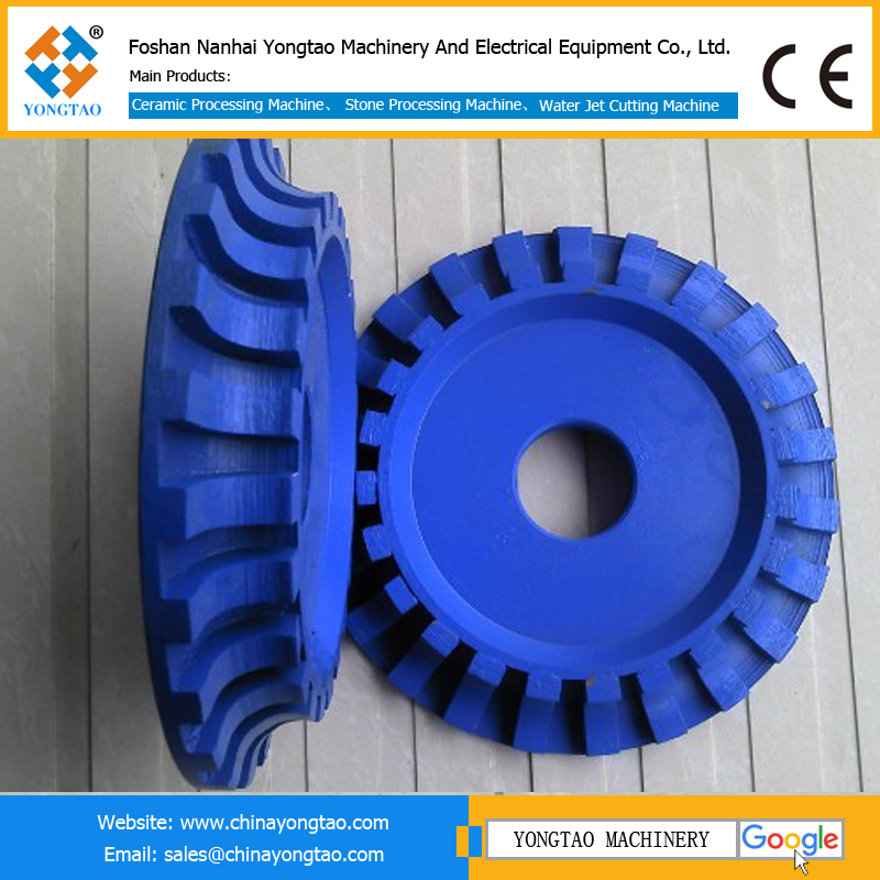 Sintered stone rounding wheel